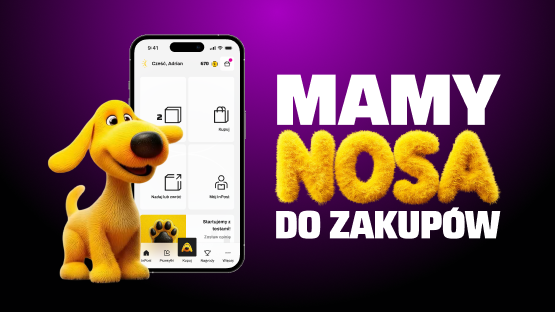 Mamy nosa do zakupów! Uśmiechnięty żółty pies stoi obok ekranu telefonu z włączoną aplikacją InPost